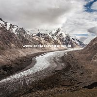 A Frozen River & Snow-Clad Peaks