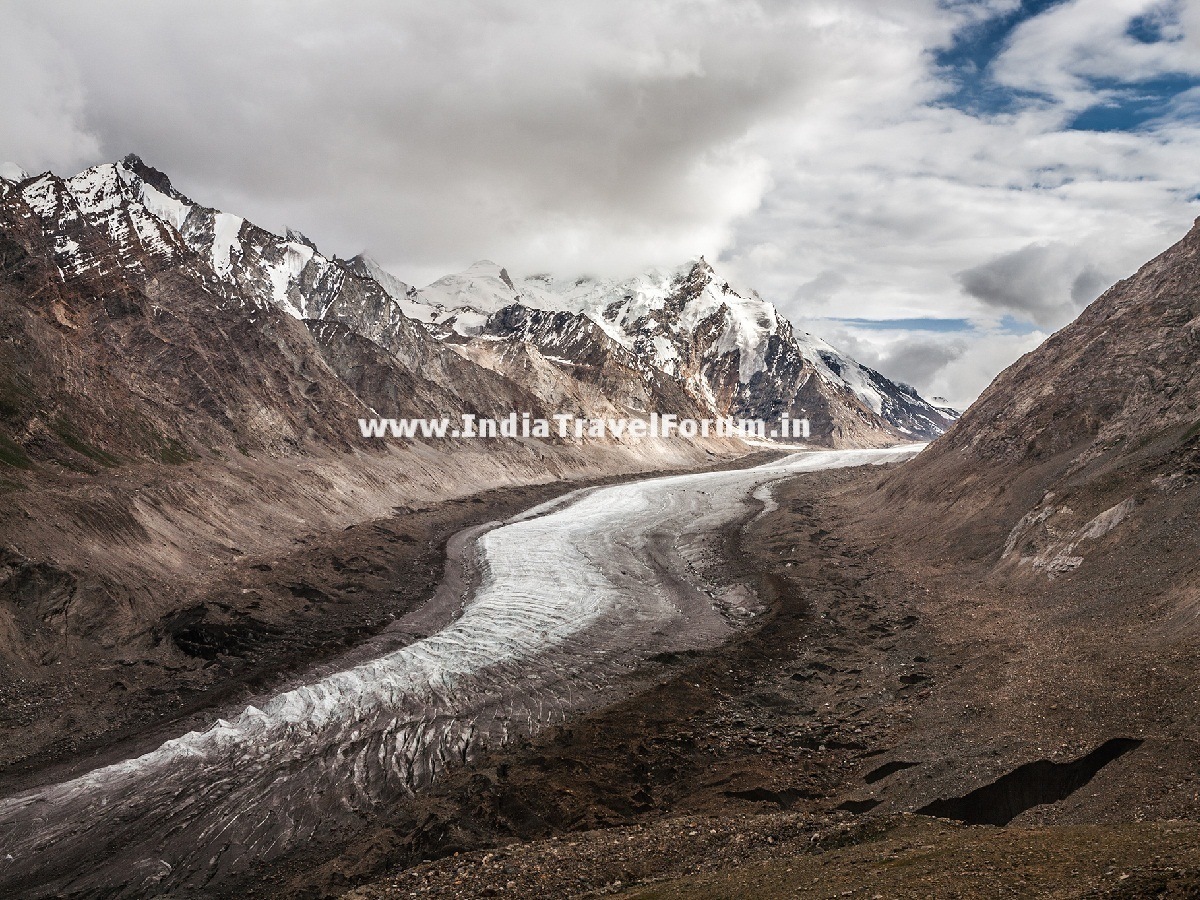 A Frozen River & Snow-Clad Peaks